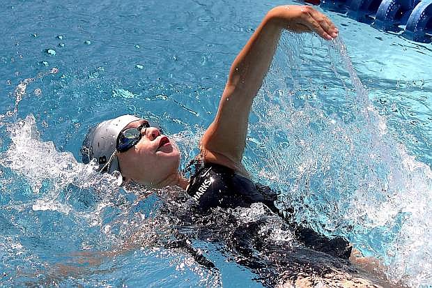 Lilli Kolb, age 7, swims the backstroke for the Carson TIgersharks.