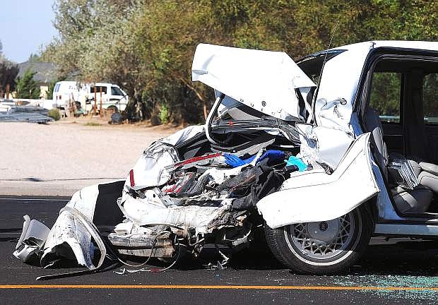 A Buick Park Avenue was rear-ended by a semitrailer Tuesday on the Reno Highway. Two people were injured.
