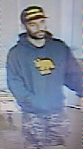 Image of the man suspected to be involved in the stolen credit card case.