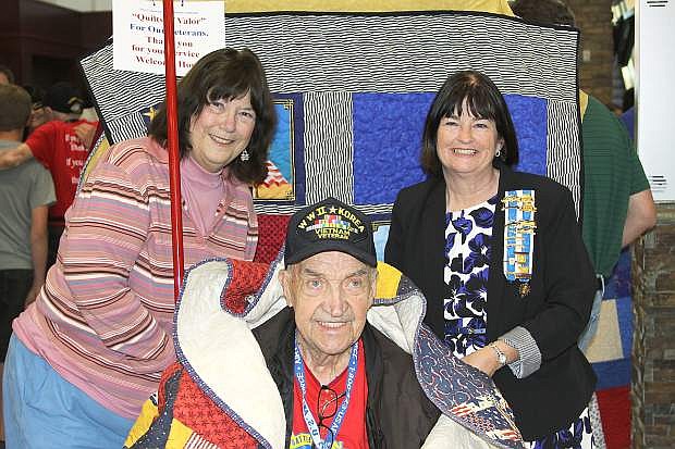 Robert and Donna Curtis, along with Carson City Supervisor Lori Bagwell, right, are seen at the Reno-Tahoe International Airport when Robert returned from the District of Columbia after an Honor Flight to Washington, D.C.