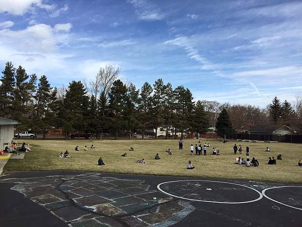 Kindergartners and first, second, third and fourth grade students at St. Teresa of Avila Catholic School took their learning outside to Drop Everything and Read, a way in which the school participated in Read Across America Week.