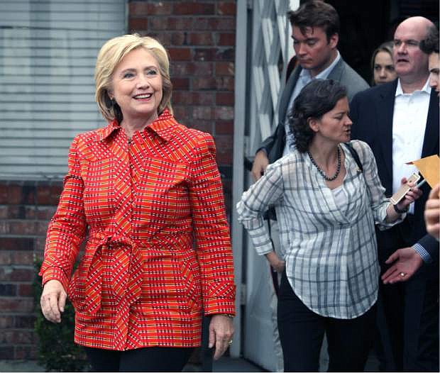 Democratic presidential candidate Hillary Rodham Clinton departs the Crossroads an Substance Abuse Facility sponsored by Catholic Charities of Northern Monday, Nov. 23, 2015, after a tour in Reno, Nev. (AP Photo/Lance Iversen)