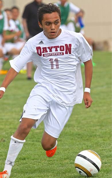 Dayton&#039;s Jacob Duran moves the ball downfield against the Douglas Tigers Saturday in Minden.