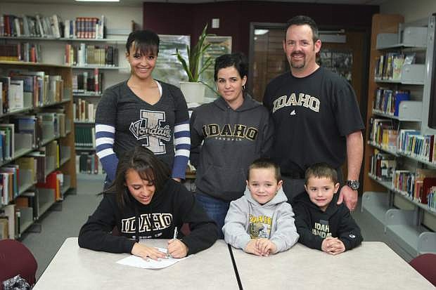 Carson High School senior Josilyn Daggs signs her letter of intent to play soccer at the University of Idaho on Wednesday with her family, Tiana Daggs, Tara and Mike Lannom and brothers 7-year-old Troy and 6-year-old Luke.