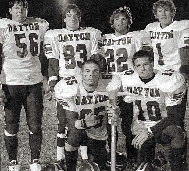 Dayton football players pose for a photo in 2003, the first year the Dust Devils won the Gold Mining Pick football trophy passed around Yerington, Dayton and Fernley high schools in Lyon County.