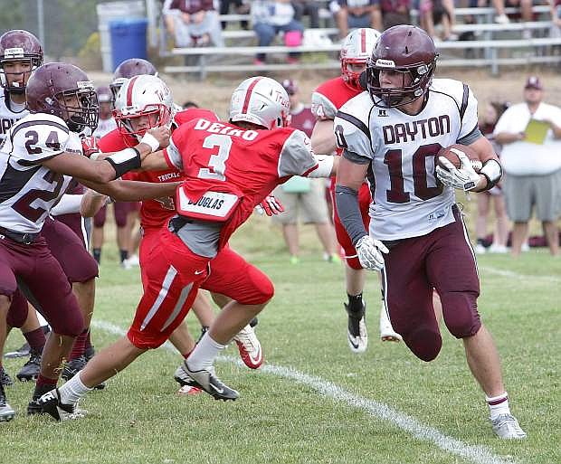Dayton&#039;s Austin Fletcher runs to the outside against Truckee earlier this year.