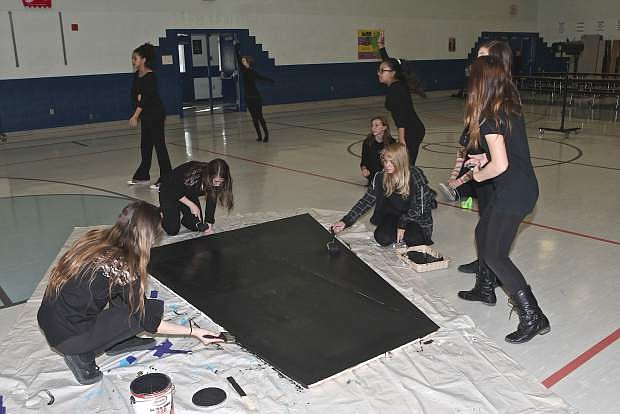 Dayton Intermediate School theater students prepare props for their upcoming presentation December 5th and 6th.