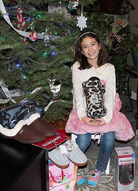 When Breanna De Luca of Carson City turned 9 years old on Nov. 11, she asked her friends to bring slippers, robes, blankets and other items to donate to residents in local nursing centers this Christmas. Her family and friends brought slippers, robes and blankets. She plans on donating the items as Christmas presents to residents at the local nursing centers in Carson City and Gardnerville, which are run by EmpRes Healthcare. She has volunteered at the centers and is known as the Resident Joy Advocate.
