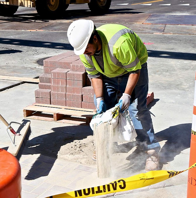 Work continues on Carson Street on Friday. The city has set an Oct. 28 date for a ribbon cutting.
