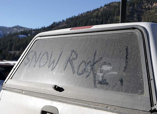 A vehicle recently parked at the Resort at Squaw Creek states the region&#039;s attitude toward snow. Aside from a storm that dumped 2-3 feet of powder in early December, the 2013-14 Tahoe winter has been very dry.
