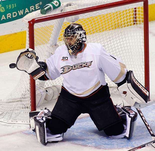 Anaheim Ducks goalie Jonas Hiller catches the puck during the second period of an NHL hockey game against the San Jose Sharks, Saturday, Nov. 30, 2013, in San Jose, Calif. (AP Photo/George Nikitin)