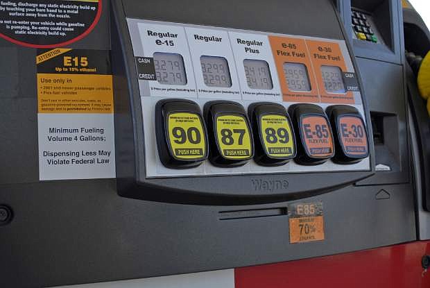 This July 11, 2012, handout photo provided by the Renewable Fuels Association shows a Lawrence, Kansas, fueling station pump with various grades of fuel, including E15, which contains 5 percent more ethanol than the current 10 percent norm sold at most U.S. gas stations. E15 is sold in just 20 stations in six Midwestern states, but could spread to other regions as the Obama administration considers whether to require more ethanol in gasoline; it&#039;s cheaper and cleaner but it could damage older cars and motorcycles. The American Petroleum Institute has asked the Supreme Court to block sales of E15. The Court could decide as soon as Monday, June 24, 2013, whether to hear the ethanol case.  (AP Photo/Renewable Fuels Association, Robert White)