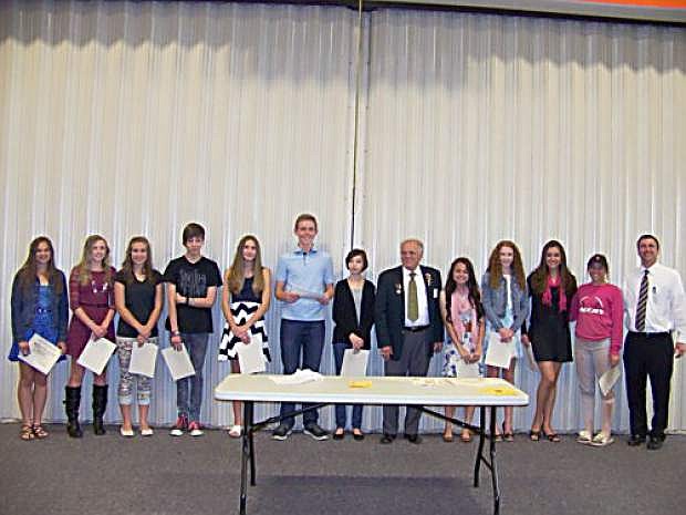 Tahoe/Douglas Elks 2670 presented certificates and gift cards to students of the month who achieved a 4.0 grade-point average. Mackensie Wagstaff; Elijah Smith; Hannah Corgan; Ian Ozolins; Juan Urena; Mackenzie Brixey; Sierra Franklin; and Rachel McCready White stand with Jim Plamenig, past president of Tahoe Douglas Elks 2670, and Vice Principal Mike Rechs.