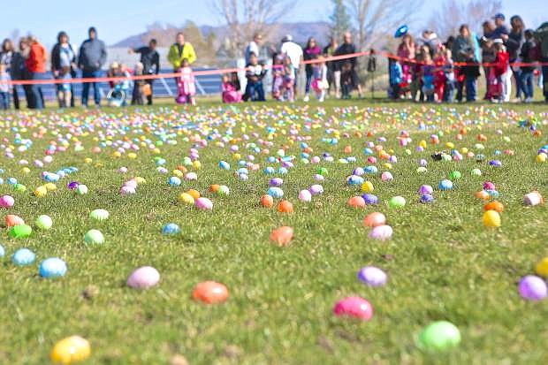Easter eggs lie scattered in the grass at Seeliger Elementary .