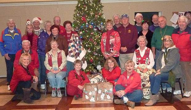 Members of the Tahoe-Douglas Elks Lodge 2670 delivered Christmas baskets filled with food, hygiene products, cookies, a lap quilt donated by Carson Valley Quilt Guild and other items to 10 senior families in Carson Valley on Dec. 20.