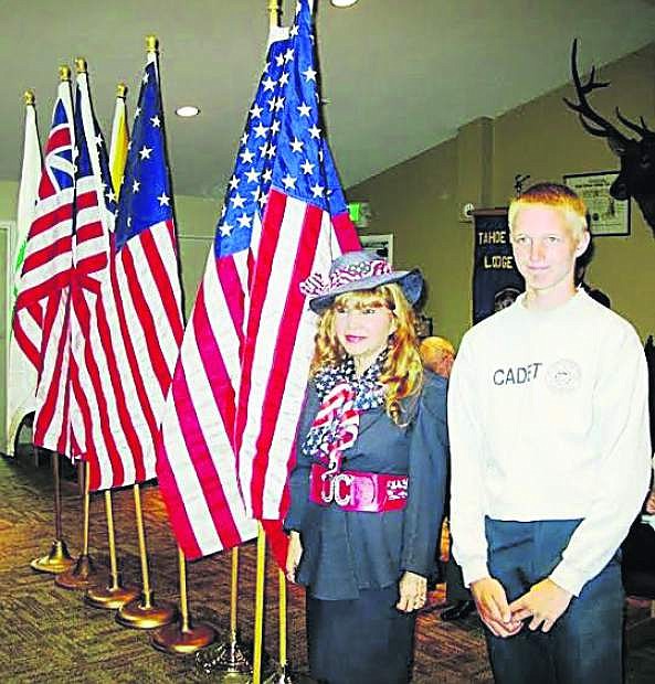 Lucy Wise and Dallas Clark, a cadet with the East Fork Fire and Paramedic Explorers, are shown with flags during the Tahoe/Douglas Elks Lodge 2670 Flag Day celebration on June 14.