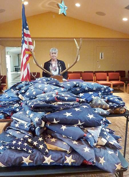 Tahoe/Douglas Elks held a flag retirement program on Sat., Feb. 14, when more than 300 worn and damaged U.S. flags were retired with dignity. Shown is Exalted Ruler Toni Wendt.