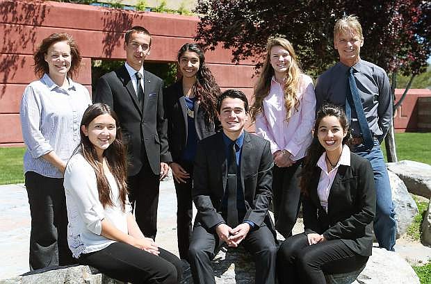 From left rear, adviser Angila Golik, Future Business Leaders of America students Logan Mead, Eveline Delgado, Sophia Waite, adviser Billy McHenry and front row from left, Jiavanna Wong-Forunato, Ricky Garcia and Shaylin Segura pose at Carson High School. The club is raising money to attend the national convention in Atlanta on June 26-July 3.