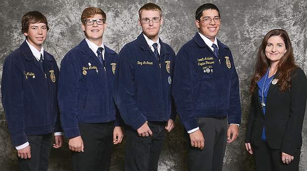 Local students compeing at the National FFA Dairy Cattle Evaluation and Management Career Development Event were, from left Clay Mulder, Blane Merkley, Trey McGowen, Garrett Archuleta and adviser Kristina Moore.