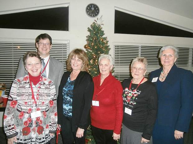 Fernley Republican Women held its annual Christmas and installation dinner on Tuesday, when District Court Judge Leon Aberasturi administered the Oath of Office to the incoming officers, including Anita Trone, president; Carol Franich, first vice president; Connie Stevens, second vice president; Shirley Chandler, secretary; and Peggy Gray, treasurer. Shown from the left are Trone; Aberaturi; Franich, Stevens; Chandler and Gray.