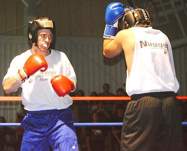 True Hanley fights in the rin with Bryson Abe in the 2015 Night of Fights in Fallon.