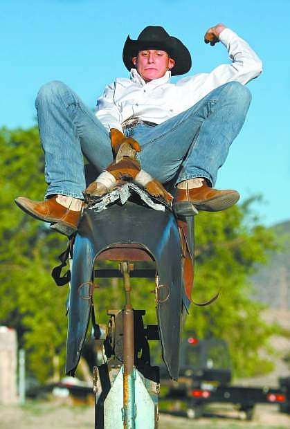 Cody Kiser practices on a mechanical bull at his Mound House home in this Nevada Appeal file photo.