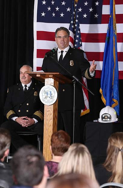 Carson City Fire Chief Bob Schreihans speaks at his badge-pinning ceremony at Station 51 in Carson City on Tuesday. Schreihans, who is the fifth paid chief in the history of the department, has been with CCFD for nearly 31 years. Assistant Chief Tom Tarulli, left, served as emcee for the ceremony which drew about 125 people.
