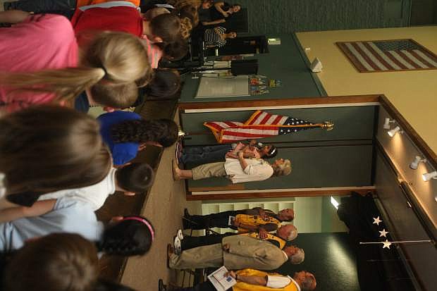 Bordewich-Bray Elementary students say the pledge of allegiance at the start of a presentation put on by the Carson City Lion&#039;s Club on Friday.
