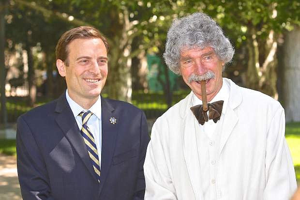 Attorney General Adam Laxalt and McAvoy Lane (aka The Ghost of Mark Twain) pose for a photo prior to Flag Day and the Army&#039;s 240th birthday celebration ceremonies on the Capitol Mall Friday morning.