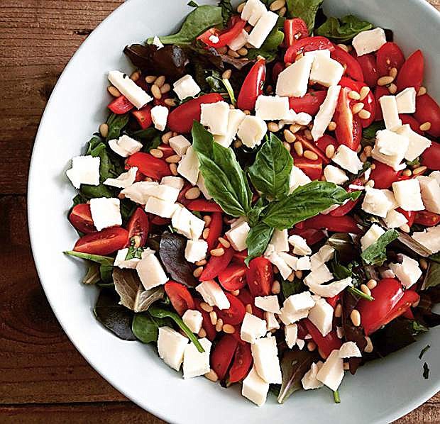 Caprese salad, an Italian classic, makes a lovely addition to summer potlucks and dinners.