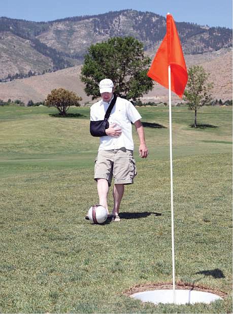 Rob Mason, PGA Head Pro at Silver Oak Golf Course, tries out the first footgolf hole recently.