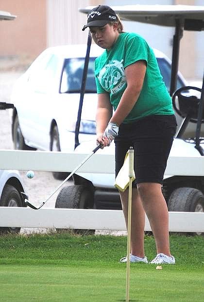 Fallon sophomore golfer Carissa Parsons practices chipping at the Fallon Golf Course. Parsons qualified for the state tournament last season.