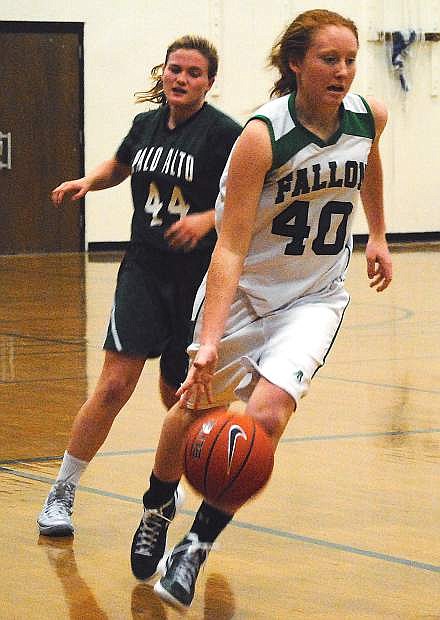 Fallon forward Kayla Buckmaster dribbles down the court during Saturday&#039;s game against Palo Alto (Calif.) at the Silver State Slam Tournament at McQueen High School in Reno.