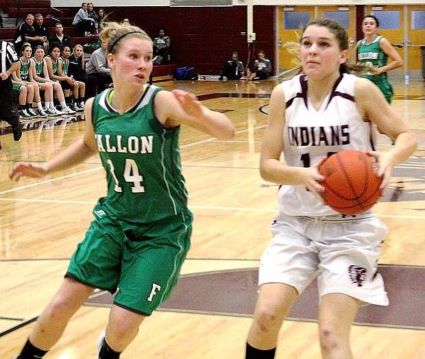 Fallon&#039;s Megan McCormick chases down Elko&#039;s Emily Elquist during the Indians win on Saturday.
