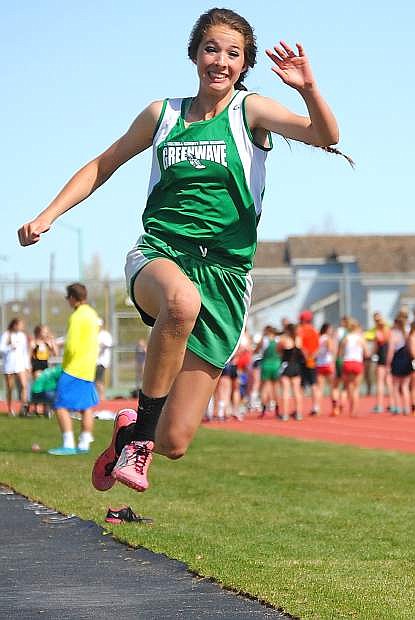 Lady Wave freshman Brynlee Shults bounces through the air duirng the triple jump at Saturday&#039;s Fallon Elks Inviational. Shults finished seventh.
