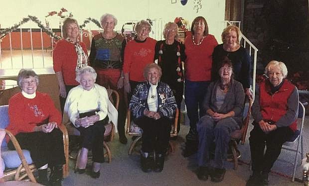 Members of the Mark Twain Garden Club are seen at their holiday celebration. From the left, front row, are Gillian Mellor, secretary; Gertrude Gottschalk; Mary Lou Pawley, vice president; Cyndy Brenneman; and Elaine Berge. From the left, back row, are Sable Shaw, treasurer; Bonnie Bullis; Ann Wagner; Lorraine Walsh; Judy Hammock and Marge Cole, president. Members not pictured are Jackie Baily, Eileen Bianchi; Glendanne Block; Gladys Crum; Pat Holb; Jo Saulisberry; and Greta Weyant.