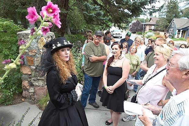 Mary Bennett leads the Ghost Walk through downtown Carson City, Nev., on Saturday, July 19, 2014.