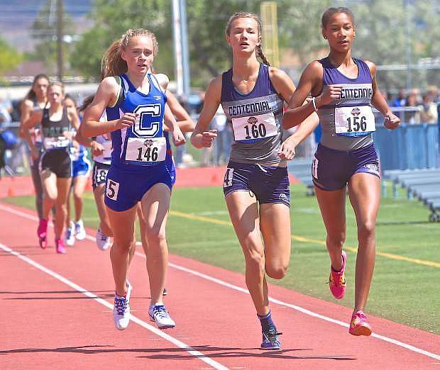 Carson freshman Abby Pradere keeps pace with Centennial&#039;s Karina Haymore (center) and Alexis Gourrier (right) in the Div. I 1600-meter race Saturday at the NIAA State Championships at Carson High School.