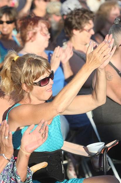 LaDonna McClusky of Carson City claps along with Kalimba on Saturday at the Gold Dust West.