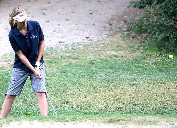 Fallon golfer Shelby Neidigh chips out of the rough during Wednesday&#039;s Northern Division I-A match in South Lake Tahoe.