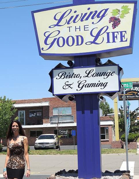 Gina Rohrer stands in front of her business called Living the Good Life, at the corner of North Carson and West Adams streets. Rohrer hopes to open the business in mid-July.