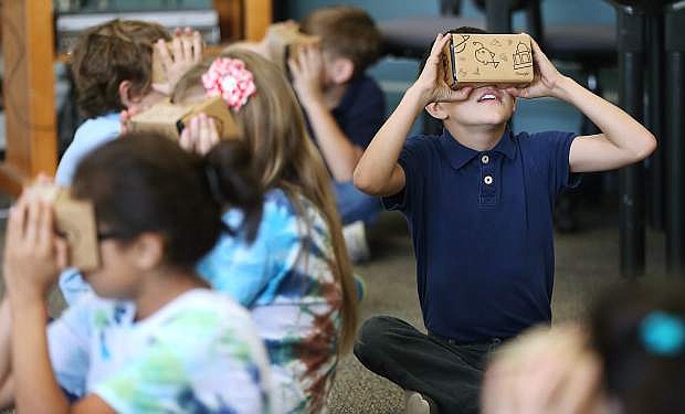 Bordewich-Bray fourth grader Phoenix Karr, 9, goes on a Google Expedition at the Gleason Facility in Carson City, Nev. on Tuesday, May 3, 2016. Approximately 250 Fremont Elementary and 400 Bordewich-Bray 2nd through 5th grade students got to check out the virtual reality panoramas through the Google Expedition Pioneer Program.