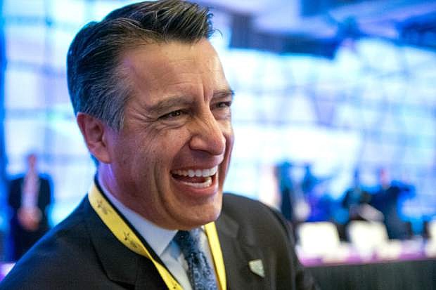 Nevada Governor Brian Sandoval participates in the opening session of the National Governors Association Winter Meeting in Washington, Saturday, Feb. 20, 2016. (AP Photo/Cliff Owen)