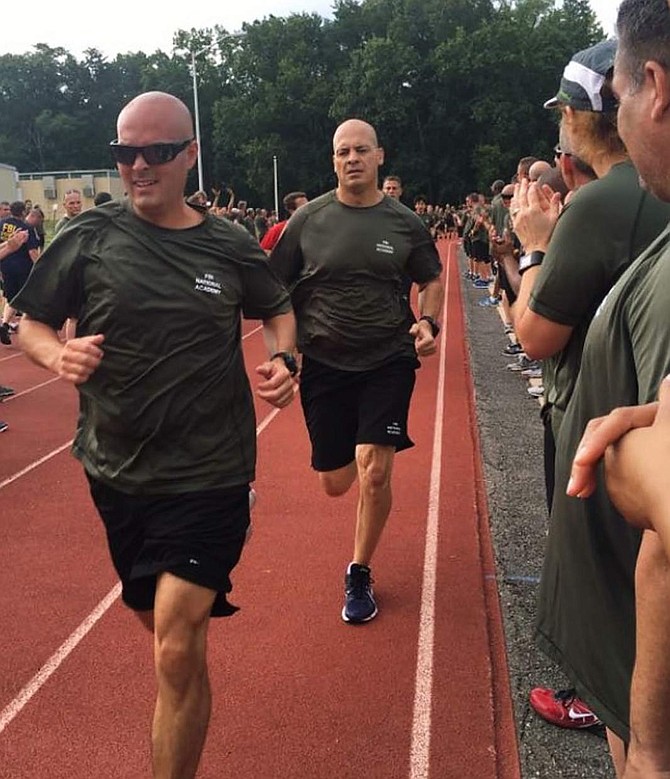 Carson City Lt. Brian Humphrey (front) trains with his fellow cadets at the FBI National Academy this summer. At the end of the training, the trainees had to run the imfamous Yellow Brick Road, a 6.1 mile course filled with two miles of obstacles.
