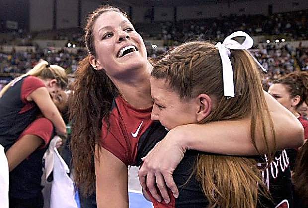 Former Fallon and Stanford star Jennifer Hucke celebrates the 2004 national championship.