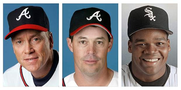 FILE - From left are Tom Glavine in 2008, Greg Maddux in 2008, and Frank Thomas in 1994 file photos. Glavine, Maddux and Thomas will appear on the Baseball Hall of Fame ballot for the first time when it is mailed to writers next month. (AP Photo/File)