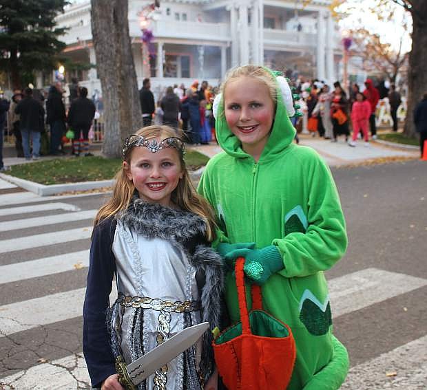 Sisters Larkin, 8, and Brynn, 10, Russell show off their costumes at the trick or treat at the Governor&#039;s Mansion Monday. Larkin went as a warrior princess and Brynn was a chameleon.