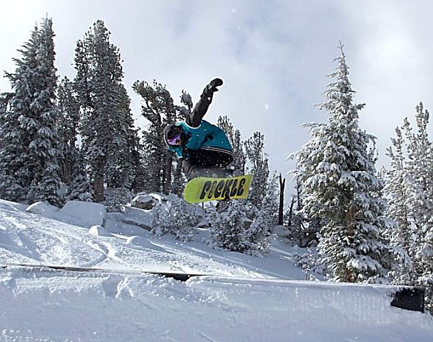 A snowboarder catches some air at Heavenly Mountain Resort on Tuesday. Heavenly received 14 inches of snow in the past week, allowing for the opening of the Big Dipper Trail.