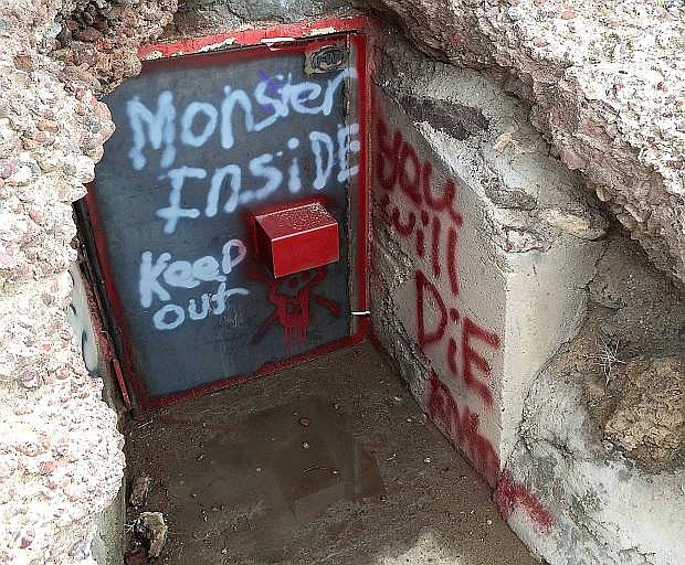 Vandals struck Hidden Cave east of Fallon recently leaving graffiti and bullet holes in a building. A $1,000 reward is being offerd for information about the person or persons responsible.