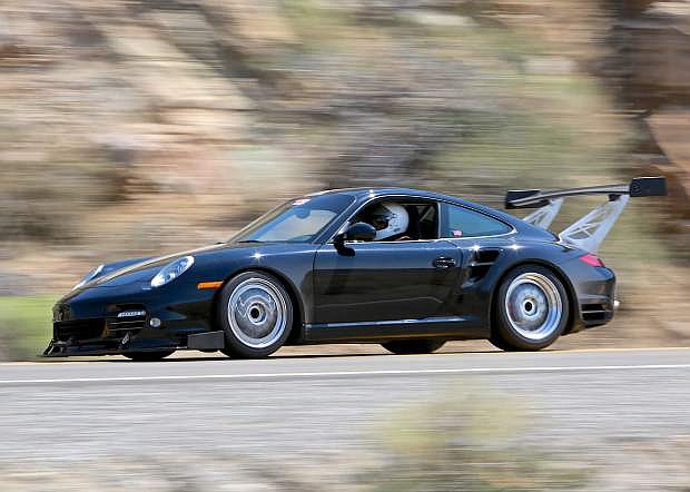 A Porsche 911 blasts up Occidental Grade (Hwy. 341) towards Virginia City during the Ferrari Club of America&#039;s (Pacific Region) annual hillclimb event Saturday. The event continues today and is free for spectators.